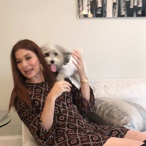 Puppy MAY have been too excited... | Debra Messing