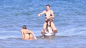 Ireland Baldwin plays game of chicken in the ocean with friends
