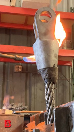 Our shop guys say this is their absolute favorite kind of sling end to make. Of course, it involves melting zinc with propane-fueled fire, banging on things, and a high chance of being burned — what's not to love? Don't worry! Our team has all the proper protective gear, fire suppressant, and a first aid kit nearby. 😉 We'll send out some more curated, detailed posts of this process later. For now, we thought you'd enjoy seeing the brief overview: 1. Clean and flower the wire rope ends thoroughl