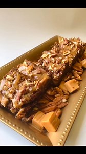 Meet our Caramel Turtle Brownies loaded with rich chocolate morsels, drenched in creamy caramel sauce, topped with crunchy pecans, and finished with even more chocolate. Pure indulgence in every bite! 🍫🥜🍫 | Shic’ Treats