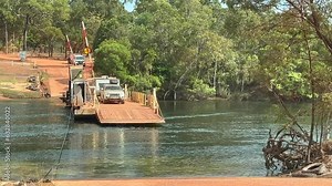 CAPE YORK, QLD - JUNE 18 2023:Jardine River Ferry crossing. Jardine River, also known as Deception river, the largest river of the Cape York Peninsula in Far North Queensland, Australia.