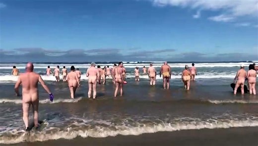 Northern Ireland skinny dippers are all heart as 50 strip-off for charity!