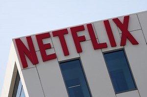 Netflix slides on Q2 earnings, Tesla investors worried, Ford to pay $299M