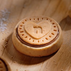 A golden baked crunchy biscuit, crafted to hold a creamy heart of Nutella®. Enjoy Nutella Biscuits! 😍 Try it now and experience the unique taste of Nutella in a biscuit #NutellaBiscuit #Nutella | Nutella