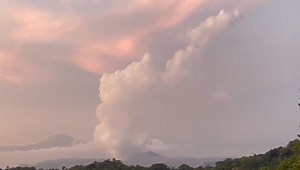 WATCH: The Taal Volcano emits thick volcanic smoke or vog on early Friday morning. According to Phivolcs, the volcano has been degassing elevated sulfur dioxide in Batangas, recently recording a total of 11,072 tons per day of SO2 emission from the main crater. As of Friday, Alert Level 1 still prevails over Taal Volcano, which means that it is still in abnormal condition and should not be interpreted to have ceased unrest nor ceased the threat of eruptive activity. (Video by Edd Gumban/The Phil