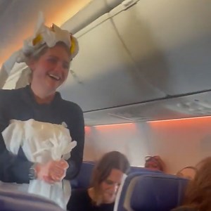 Bride-to-be walks down the aisle mid-flight in toilet paper dress