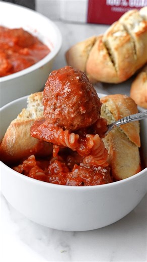 Warm up with a delicious bowl of meatball soup featuring Omaha Steaks Italian-Style Meatballs. Made in one pan and ready in under 30 minutes, this dish is perfect for a cozy weeknight meal. Ingredients: 1/2 tablespoon olive oil 1/2 small onion, chopped 1 clove garlic, minced 2 cups chicken or beef broth (or a mix of both) 14 oz. crushed tomatoes 1/2 teaspoon dried oregano 1/4 teaspoon dried basil 1/8 teaspoon black pepper 8 Omaha Steaks Italian-Style Beef Meatballs (Shop now: https://www.omahast