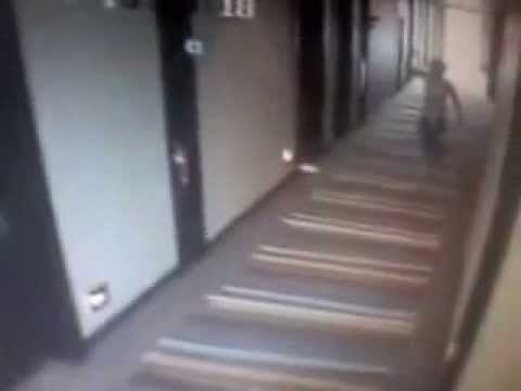 CCTV footage shows One Direction running around hotel corridor in their underwear