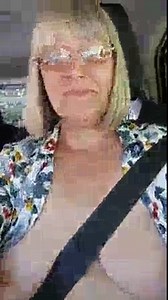 Selfie with tits exposed in the car