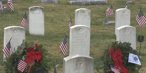 Wreaths placed on graves to honor veterans at Harrisonburg cemetery