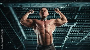 Muscular bodybuilder performing bicep workouts at a crossover cable machine, displaying strength and dedication in a gym setting. Camera 8K RAW.