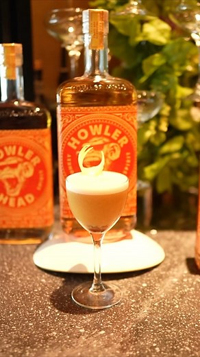 Panic at the Port 🐵🍹 Shake things up with passion fruit, lemon, and a pour of Howler Head Whiskey. #GetBananas | Howler Head