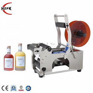 [Hot Item] Hzpk Mt 50 Bottle Water Labelling Machine for Glass Round Bottles Semi-Automatic