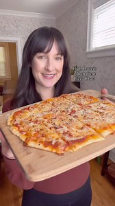 This 2-ingredient high-protein pizza crust is the perfect way to satisfy your pizza craving! Whip up this quick dough, add your favorite toppings, and you’ll have tasty pizza in no time! Comment “pizza” and I’ll send you the recipe! | I Heart Vegetables