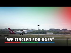 'A very big palpable sense of relief': Qantas plane lands safely in Sydney after engine failure