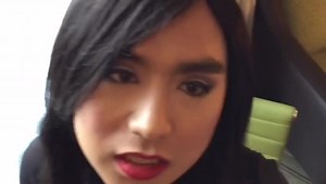 Shemale Alina in sexy black pantyhose and red mini dress | aShemaleTube
