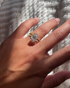 . The Ava Oval Moissanite Ring . Paired with the Delilah Band . Shown in 12x8mm, 1.5mm band | Samnsue Jewelry Design