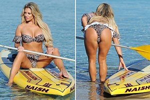 Busty Bianca Gascoigne looks incredible as she goes paddleboarding in a bikini
