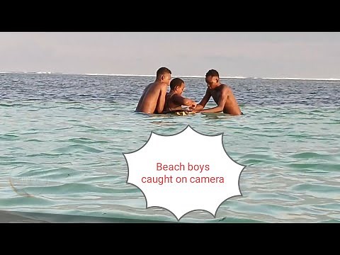 THE GANG OF BEACH BOYS CAUGHT ON CAMERA TAKING ADVANTAGE OF A LADY DURING SWIMMING.