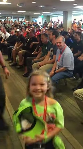 Danica Patrick hugs cute fan at NASCAR drivers meeting!