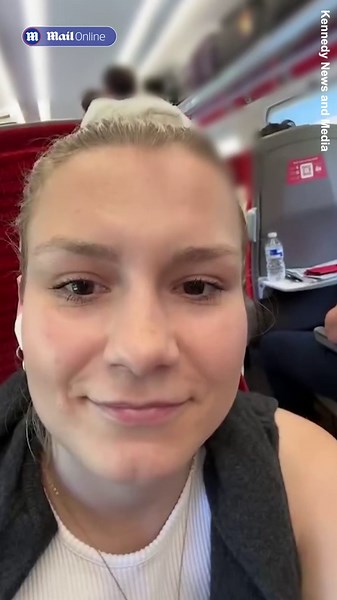 No space no problem! Businessman lays on carriage floor of packed train to work