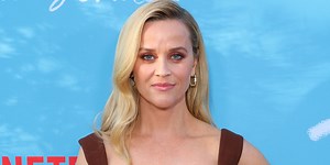 Reese Witherspoon embraces autumnal tones in chic midi dress