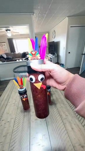 Turkey Sensory Bottles (Perfect for Toddlers!) What you'll need: • Clear bottles • Glitter • Water • Clear glue • Acrylic leaves • Feathers • Googly eyes • Sticky foam sheets • Brown food coloring How I made them: I filled each bottle about ¾ full with water, then added clear glue leaving some room to shake— this slows down the glitter so it gently falls when the kids shake it. Next, I added glitter, acrylic leaves, and a drop of brown food coloring for that turkey look. I cut the sticky foam in