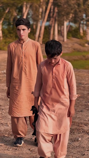 Young Males in Traditional South Asian Kurtas