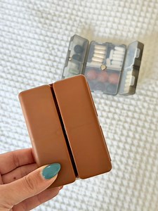 5.5K views · 18 reactions | This foldable pill organizer is perfect for trips! Slim enough for a purse, strong magnetic clasp, and everything is perfectly organized.  #organization #travelwithme #traveltips #AmazonFinds #amazonmusthaves | Everything Envy | Facebook