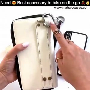 Just Dropped ⚡️ Ultimate Wristlet Case is now available in the highly requested Optic White 🙌 Classy. Chic. Carry-All. 💯 This is the all-in-one wallet you’ve been dreaming of! TAG someone who needs this 👇 Magnetic phone case is included to keep your phone from falling out 📱 Available for iPhone & Samsung models! Visit www.mahalocases.com to shop #mahalocases | Mahalo cases