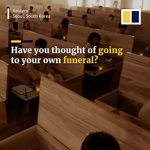 Lie in a coffin, and attend your own funeral. South Koreans are taking part in mock funerals in search of leading a better life. | South China Morning Post