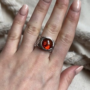 Gorgeous amber glow  Features a hammered band with a three-petaled flower in that antique style you L李VE and a round synthetic amber center! Take an Extra 50% OFF Today Only | Code: AMBER https://bit.ly/AmberGlow | Inspiranza Designs | Facebook