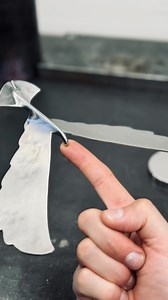 I love this balancing bird! A perfectly symmetrical design of my own making bent in just the right way to manipulate the CG so that it’s exactly on the tip of the beak! Both the beak and pin it balances on are polished by hand to a mirror shine to minimize friction! #balance #balancing #sculpture #art #artist #artwork #toy #toys #handmade #detail #sunday #sundayfunday #eagle #balancebird #balancingbird #balancingtoy #science #physics #physicsfun #gift #giftideas | Kyle's Kinetics