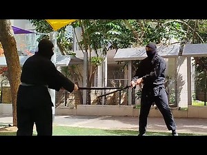 Sword sparring. Try to get inside from the sides of the opponent or escape