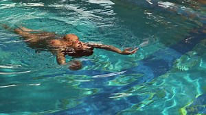 Hypnotizing mermaid Heidi Van Horny is masturbating pussy by the poolside