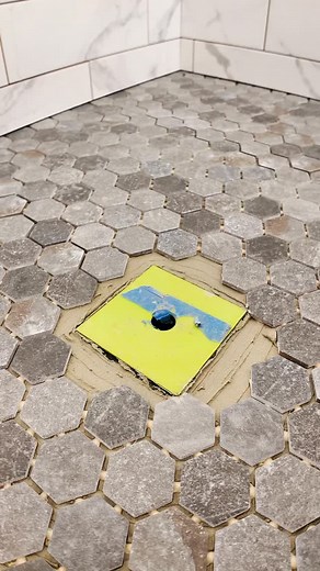 Perfect Mosaic Tile Around Drain 🧱 | Shower Remodel Clean slope. Sharp cuts. Flawless grout lines. This is how we install mosaic tile around a shower drain — precise, waterproof, long-lasting. 📍 Oregon tile & plumbing pros 📞 503-999-6866 https://taran-construction.com/services/tile-flooring-installation/ #tileinstallation #bathroomrenovation #oregonhomes #tilingexperts #mosaictile #showerremodel #contractorlife #homerenovation #plumbinginstallation #oregoncontractor #showerdrain | TilerWorks