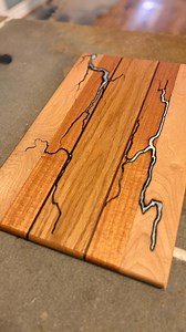 When wood meets lightning ⚡️ Handcrafted cutting board with an epoxy lightning strike running through it. #epoxyart #epoxywood #cuttingboard | Bowerbird Workshop