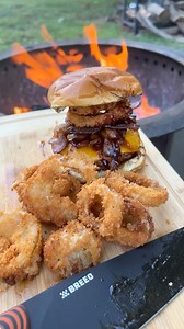 Barbecue-Onion Ring Burgers 🍔🧅🔥The flavors are unmatched with this western bbq burger cooked over the open fire. Give this a go for your next meal over the Breeo 🙌#bbq #burger #onionrings #grilling #recipe | Breeo