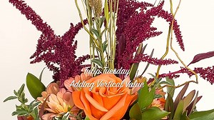 What can you do when we're filling a flower order that's gorgeous, but feels like it's "missing something"? Creating drama and adding something tall to your design can be just the ticket! In this Tulip Tuesday How-To Video Leanne shares her tips for adding vertical visual value to an arrangement. Enjoy! | Floral Design Institute