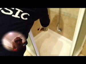 Clean the shower with lemon, baking soda, and vinegar