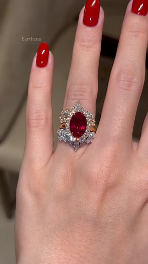 All eyes on The Gloria, our 4ct elongated oval-cut ruby halo cathedral ring, paired with the Isabella double-row V-shaped diamond bands for a bold, regal stack that speaks volumes. Red never looked so radiant. 💎❤️‍🔥 • ruby ring • oval-cut ruby engagement ring • halo cathedral setting • diamond V band • bridal ring stack • luxury ruby ring • fine jewelry Beverly Hills • ruby and diamond ring set #Earthena #Earthenajewelry #Ruby #RubyEngagementRing #DiamondBand #HaloRing #CathedralSetting #Luxur