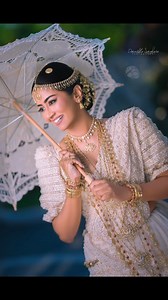 Their love, a masterpiece painted in the hues of affection, dances like the flicker of a flame, igniting hearts with its warmth. In their eyes, the world fades, leaving only the vibrant colors of their shared dreams. Their love is a story whispered in the wind, a tale of two souls bound by an eternal promise. Samitha & Vinoo | Wedding Day | 2024 Photography : Danushka Senadeera Photography Bridal Designer : Dhananjaya Bandara Wedding Planner : Janaka Mawella Weddings Groom's Outfit : Namal Balac