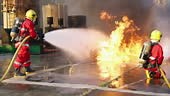 Firefighters' nighttime fire suppression training by simulating fire...