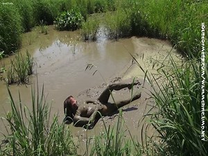 Jayce plays in a mud ditch