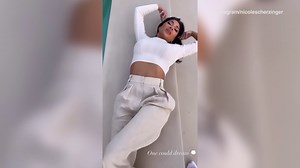 Nicole Scherzinger flashes her toned abs while striking a pose during photoshoot