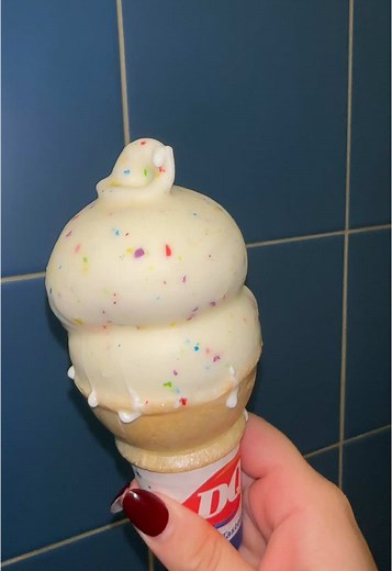 Delicious Vanilla Ice Cream Cone with Confetti Dip