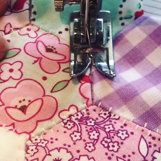 Machine sewing hexies!! Do you have your own hexies made, but not sure if you want to hand sew them altogether? 🧵 Why not use your machine?! I layer mine with fabric, batting and backing, then position the first two...usually in the middle of the project. Then I set my machine to this decorative stitch that looks like a double blanket stitch. Once I start sewing, I place the next hexie and then the next as I go. You may want to pin them to keep them straight 😉 So easy and fast! #sewingmachine 