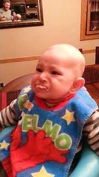 Baby Makes Hilarious Face While Eating!