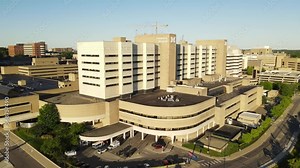 Modern hospital building in Michigan, aerial ascend view