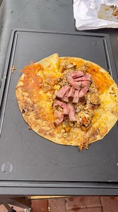 Steak and eggs burrito on the griddle | Miguels cookingwithfire